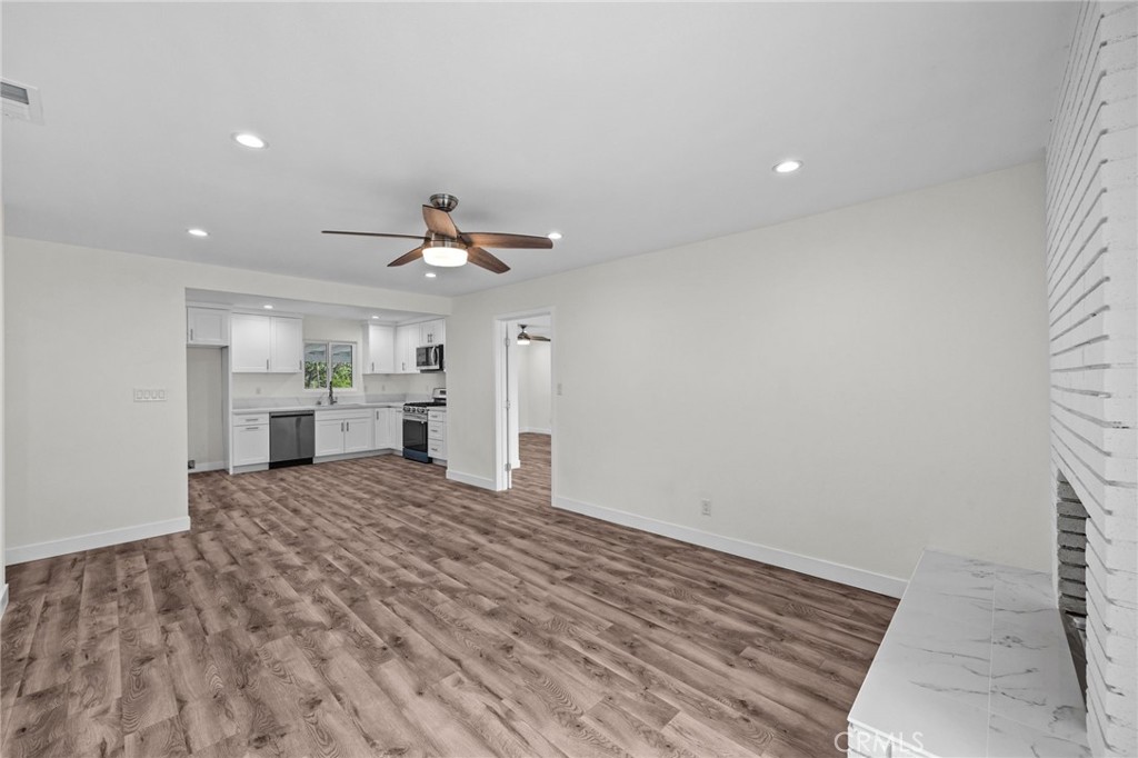 19404 Cheshire Street Rialto, CA 92377 - Photo 14 of 30 a view of a kitchen with a sink and cabinet