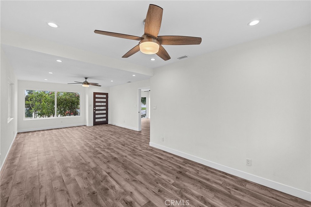 19404 Cheshire Street Rialto, CA 92377 - Photo 6 of 30 wooden floor in an empty room with a window