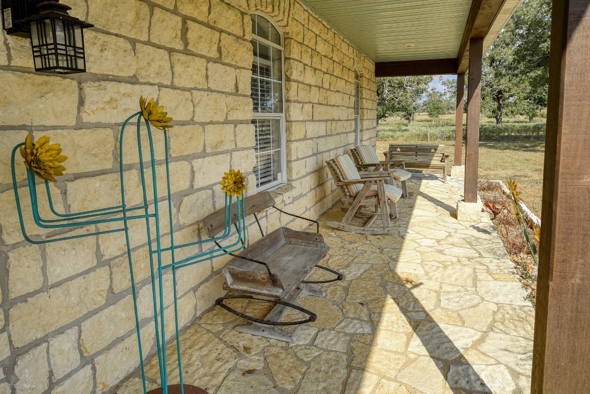 8500 Rosanky Road Waelder, TX 78959 - Photo 12 of 40 a view of a balcony with chairs