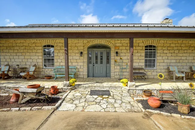 a front view of a house with patio