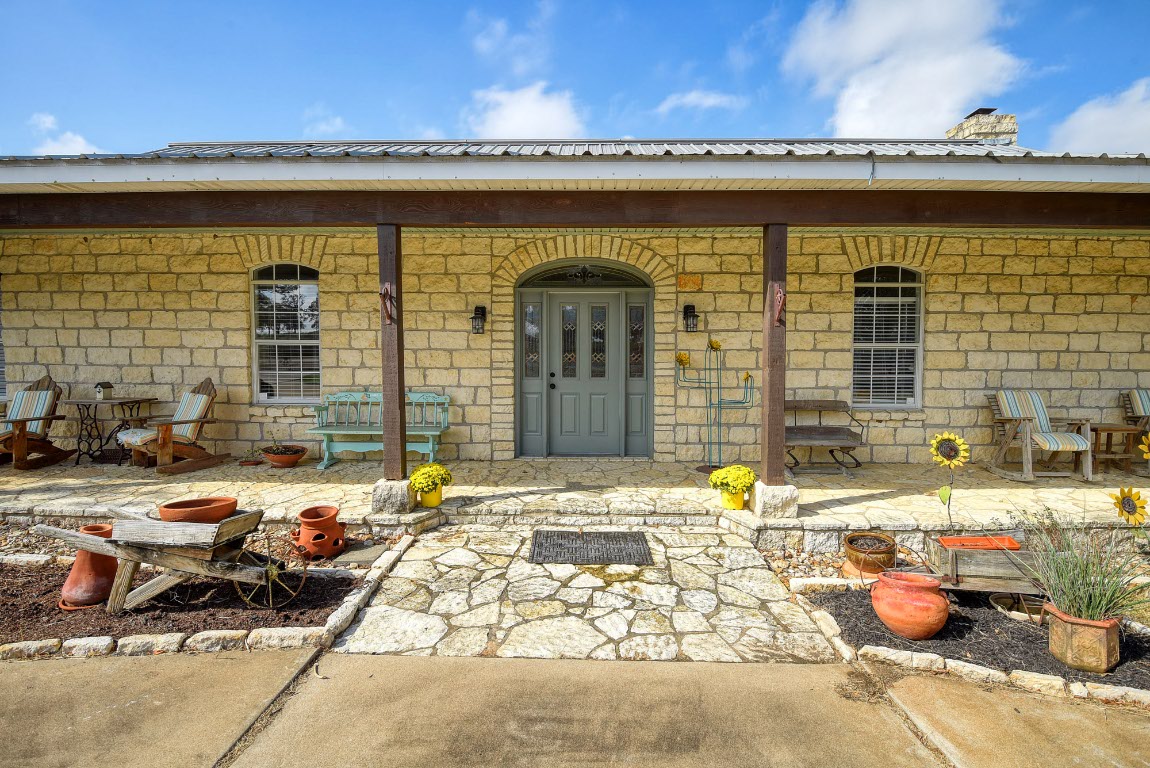 8500 Rosanky Road Waelder, TX 78959 - Photo 14 of 40 a front view of a house with patio