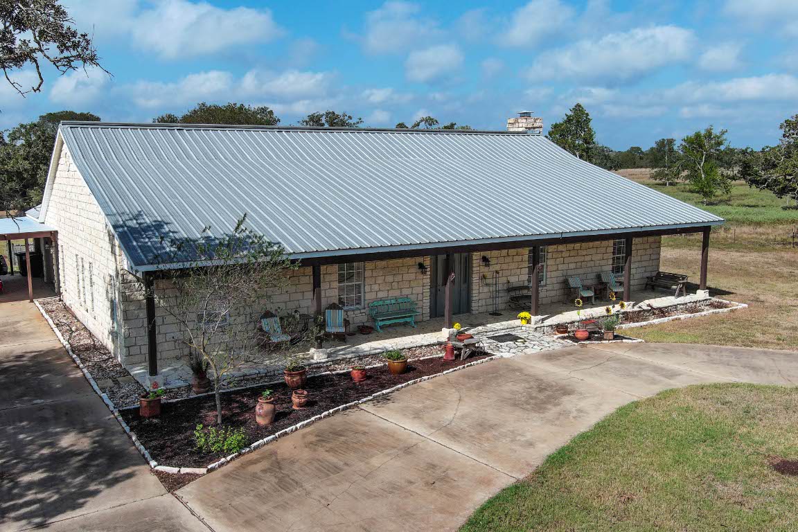 8500 Rosanky Road Waelder, TX 78959 - Photo 2 of 40 a view of a house with patio