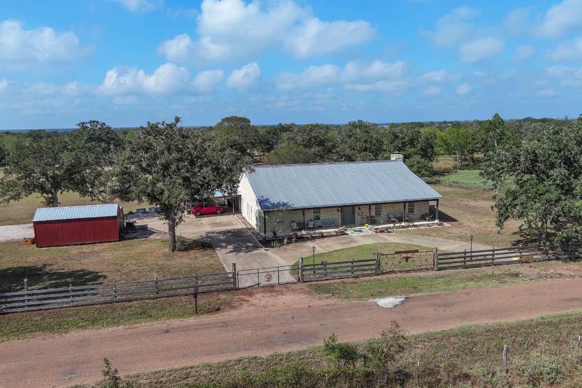 8500 Rosanky Road Waelder, TX 78959 - Photo 3 of 40 a view of a house with a yard