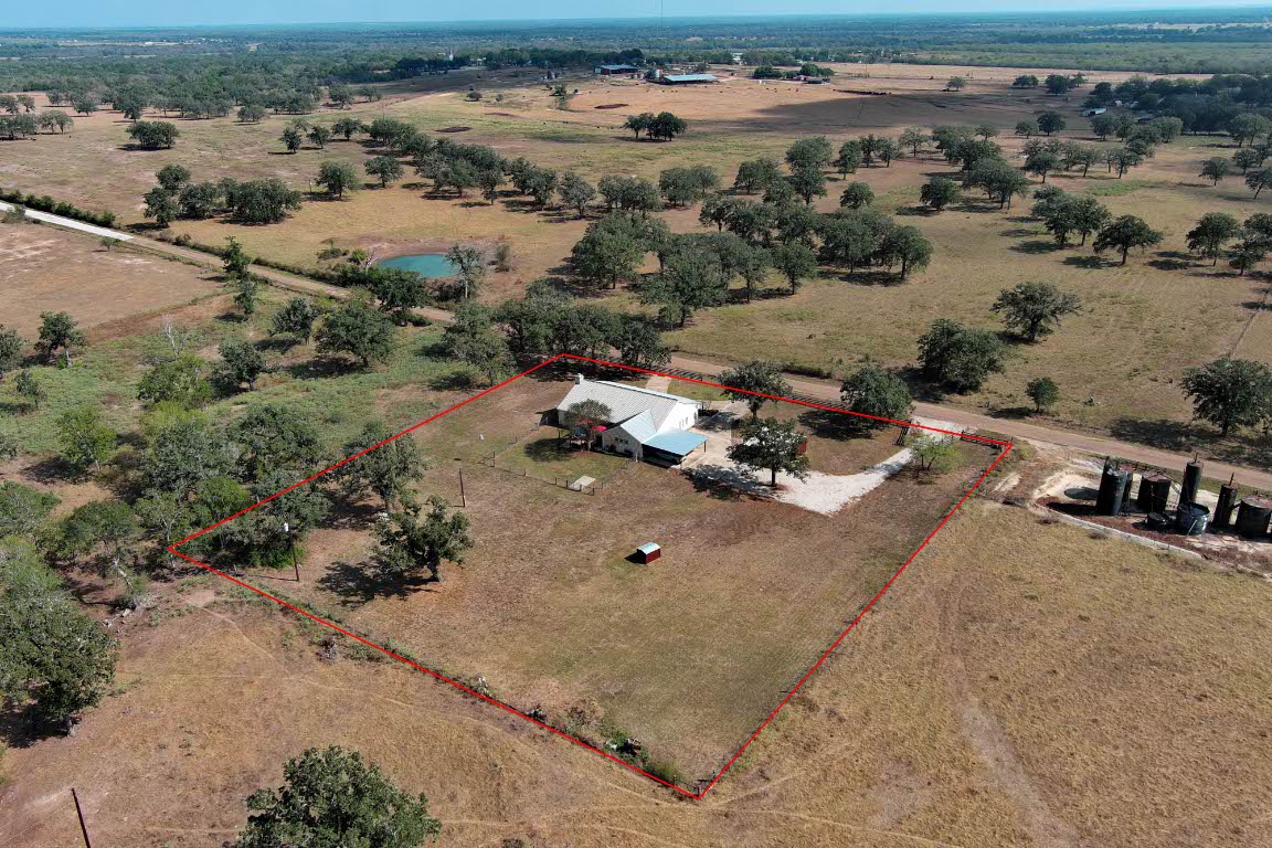 8500 Rosanky Road Waelder, TX 78959 - Photo 6 of 40 an aerial view of a house with a yard
