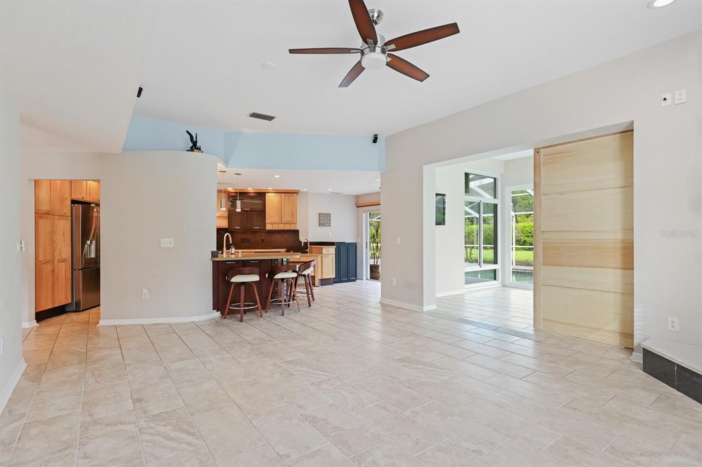 5208 Laurel Pointe Drive Valrico, FL 33596 - Photo 11 of 61 a view of work space with furniture and wooden floor