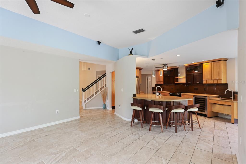 5208 Laurel Pointe Drive Valrico, FL 33596 - Photo 20 of 61 a room with lots of chairs and a view of living room