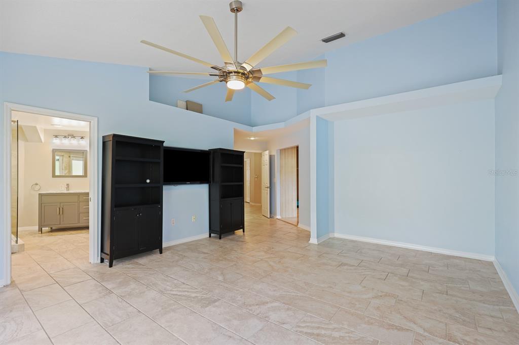 5208 Laurel Pointe Drive Valrico, FL 33596 - Photo 22 of 61 en empty room with fan and a ceiling fan