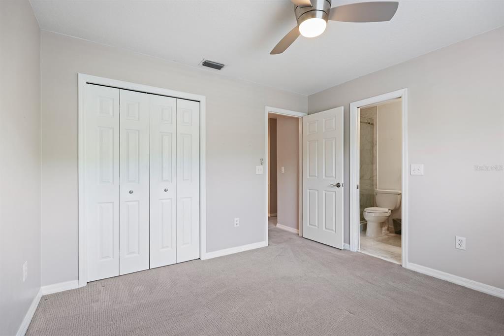 5208 Laurel Pointe Drive Valrico, FL 33596 - Photo 40 of 61 a view of an empty room and a gallery