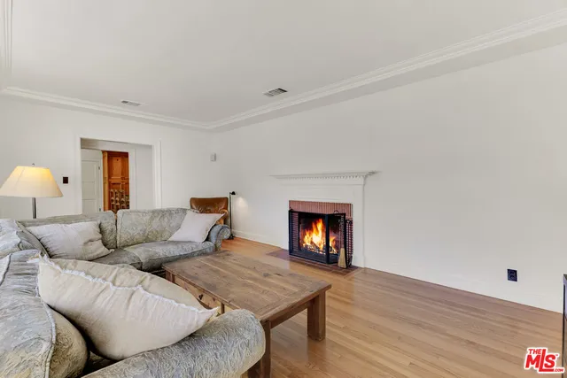 a large white bed in a white room