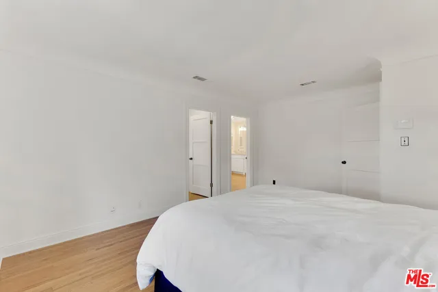 a bathroom with a sink toilet and mirror