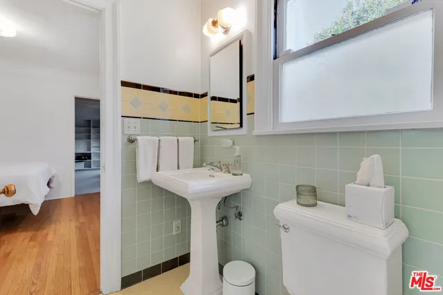 a view of a garage with trees