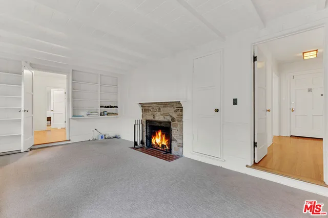 a view of an outdoor sitting area with furniture and backyard