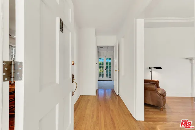 a kitchen with stainless steel appliances kitchen island granite countertop a refrigerator and a stove top oven