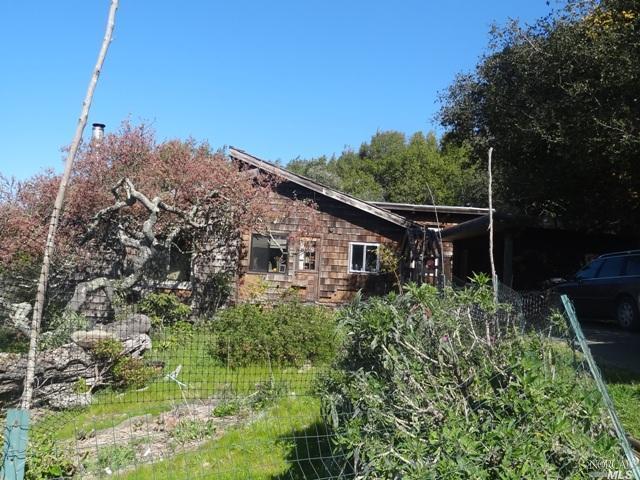 9175 Barnett Valley Road Sebastopol, CA 95472 - Photo 1 of 1 a backyard of a house with lots of green space