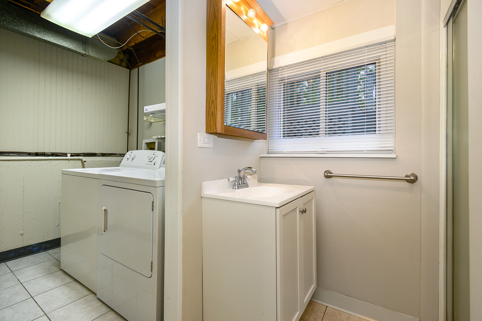 235 West Hickory Road Lombard, IL 60148 - Photo 19 of 23 a utility room with a sink dryer and washer