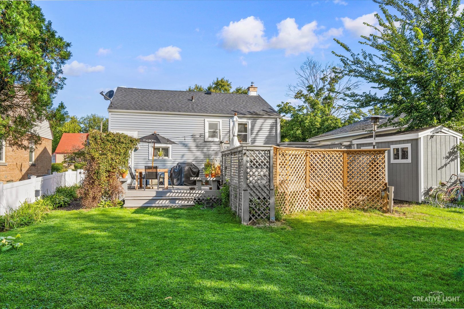235 West Hickory Road Lombard, IL 60148 - Photo 22 of 23 a front view of a house with garden