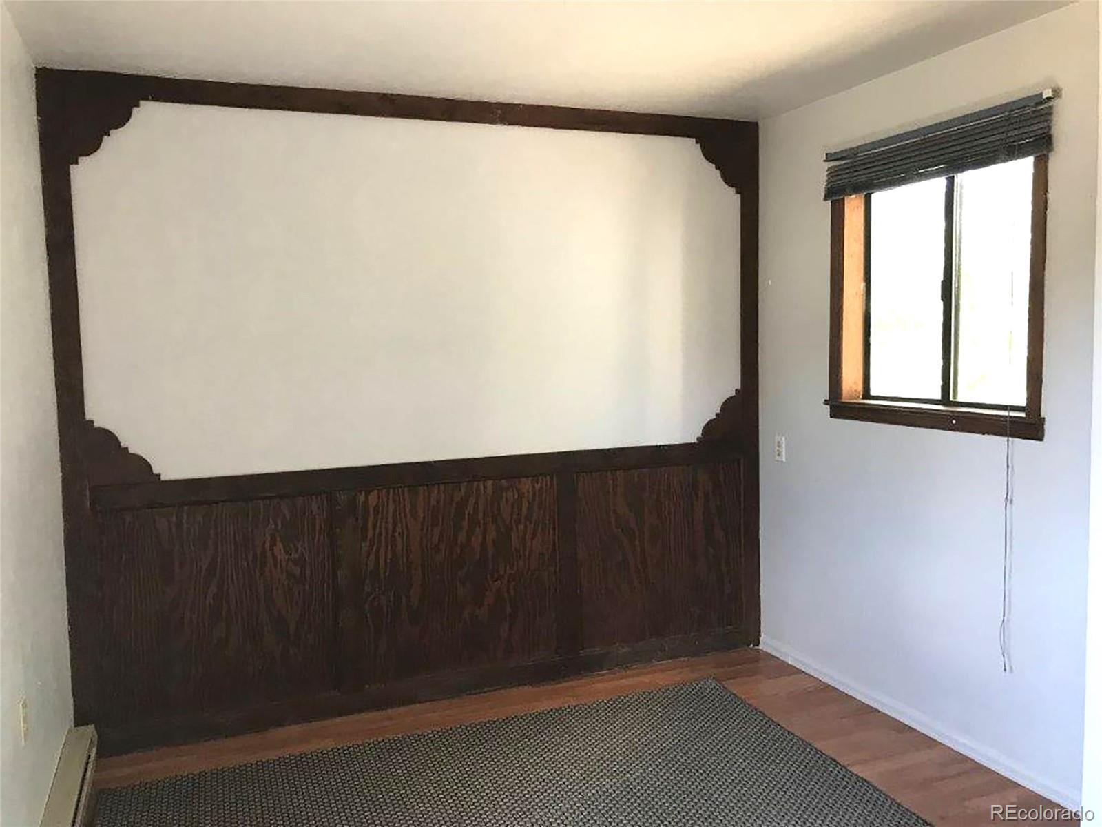 354 Neal Road Bailey, CO 80421 - Photo 14 of 19 an empty room with windows