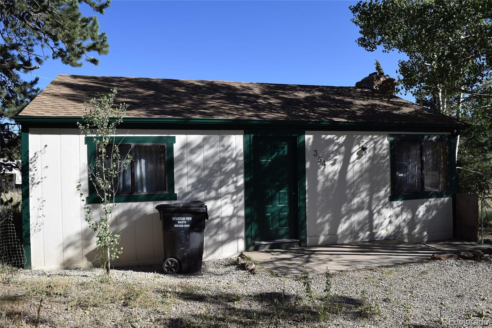 354 Neal Road Bailey, CO 80421 - Photo 2 of 19 a view of a backyard of the house
