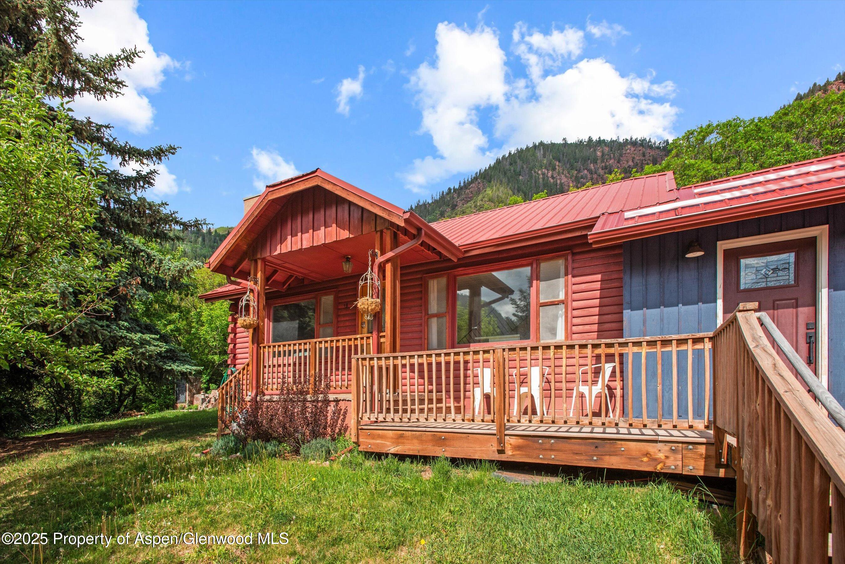 189 Ute Trail Carbondale, CO 81623 - Photo 15 of 76 a view of a house with a yard and deck