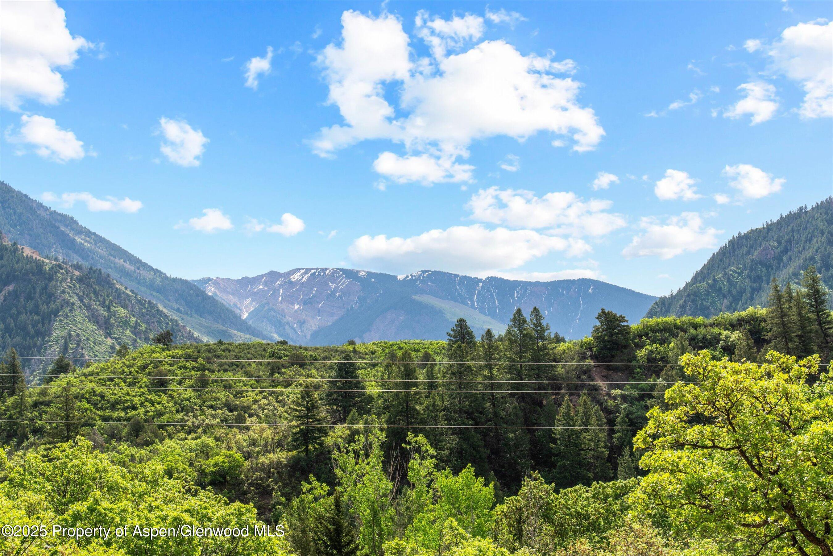 189 Ute Trail Carbondale, CO 81623 - Photo 4 of 76 a view of a lake in middle of a forest
