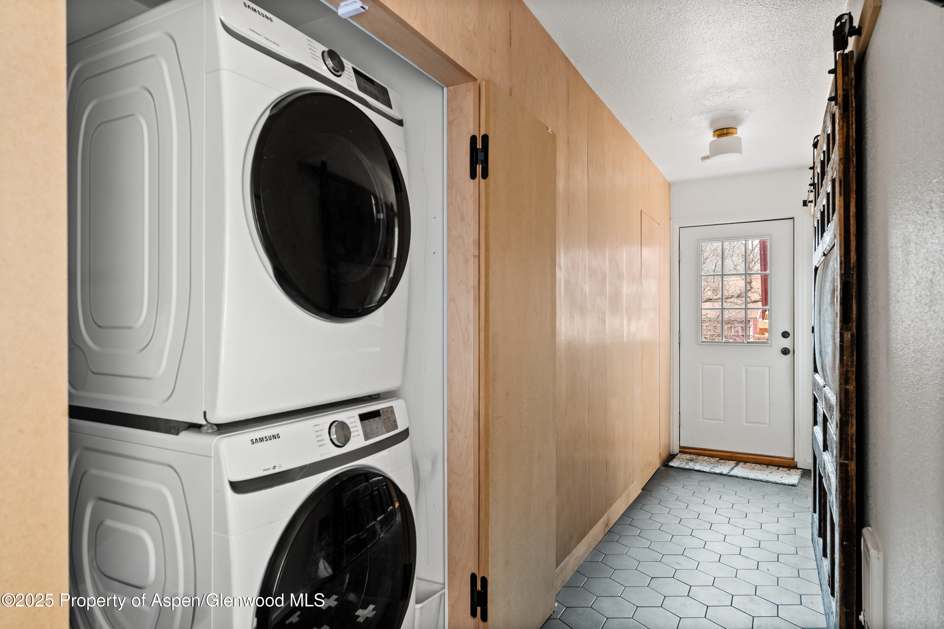 189 Ute Trail Carbondale, CO 81623 - Photo 53 of 76 a view of a hallway with washer and dryer