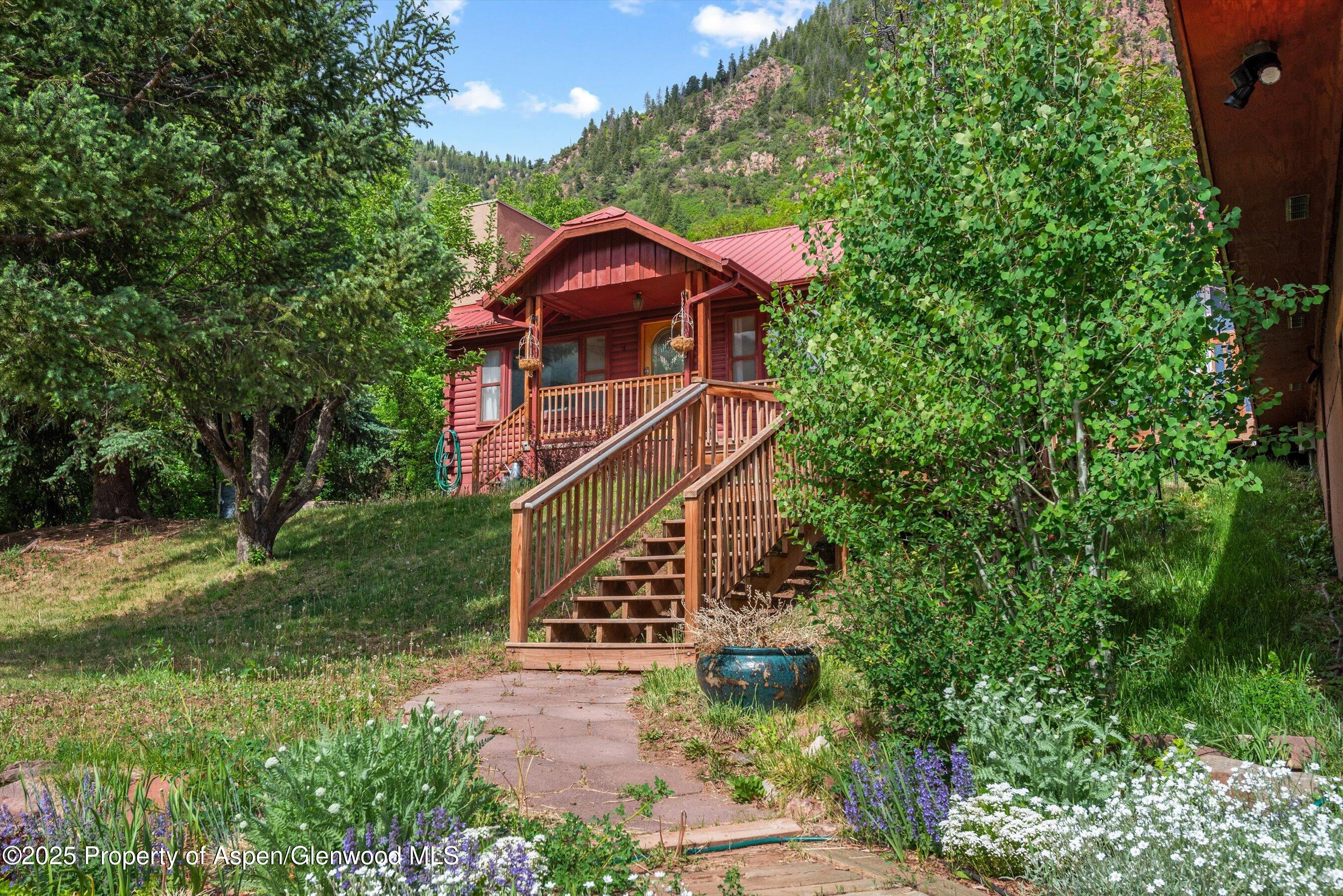 189 Ute Trail Carbondale, CO 81623 - Photo 9 of 76 a front view of a house with a yard