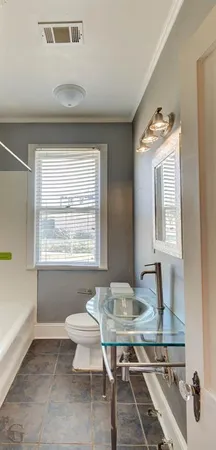 a view of a kitchen area with furniture and window