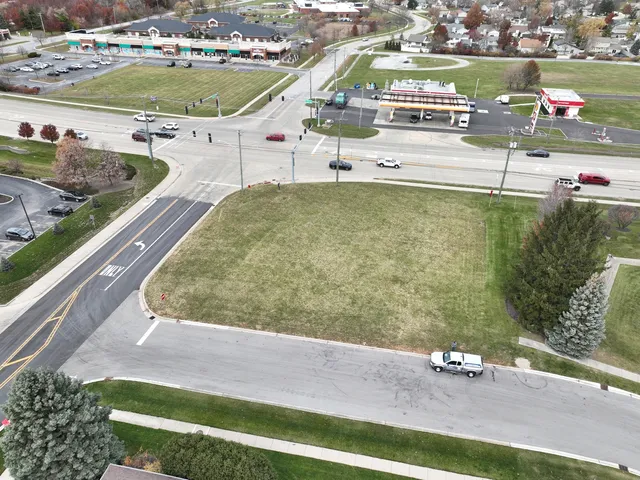 a view of a swimming pool with outdoor seating