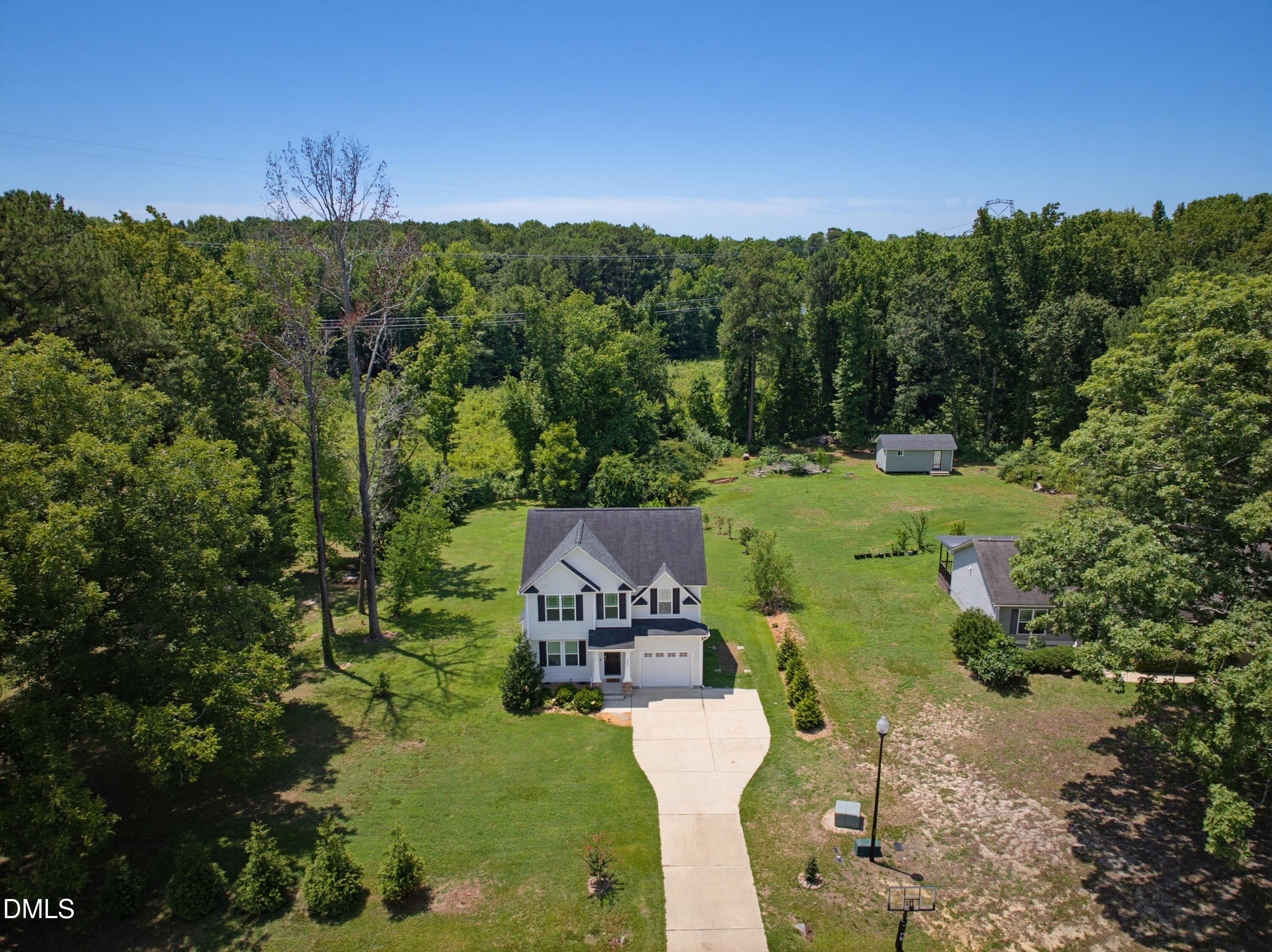 582 Roberts Road Willow Spring, NC 27592 - Photo 36 of 44 DJI_20260715123415_0001_D