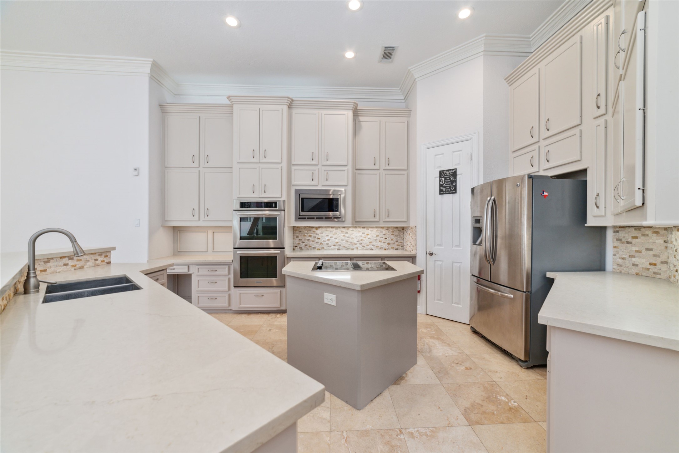 32610 Whitburn Trail Fulshear, TX 77441 - Photo 14 of 49 a kitchen with stainless steel appliances granite countertop a refrigerator sink and stove