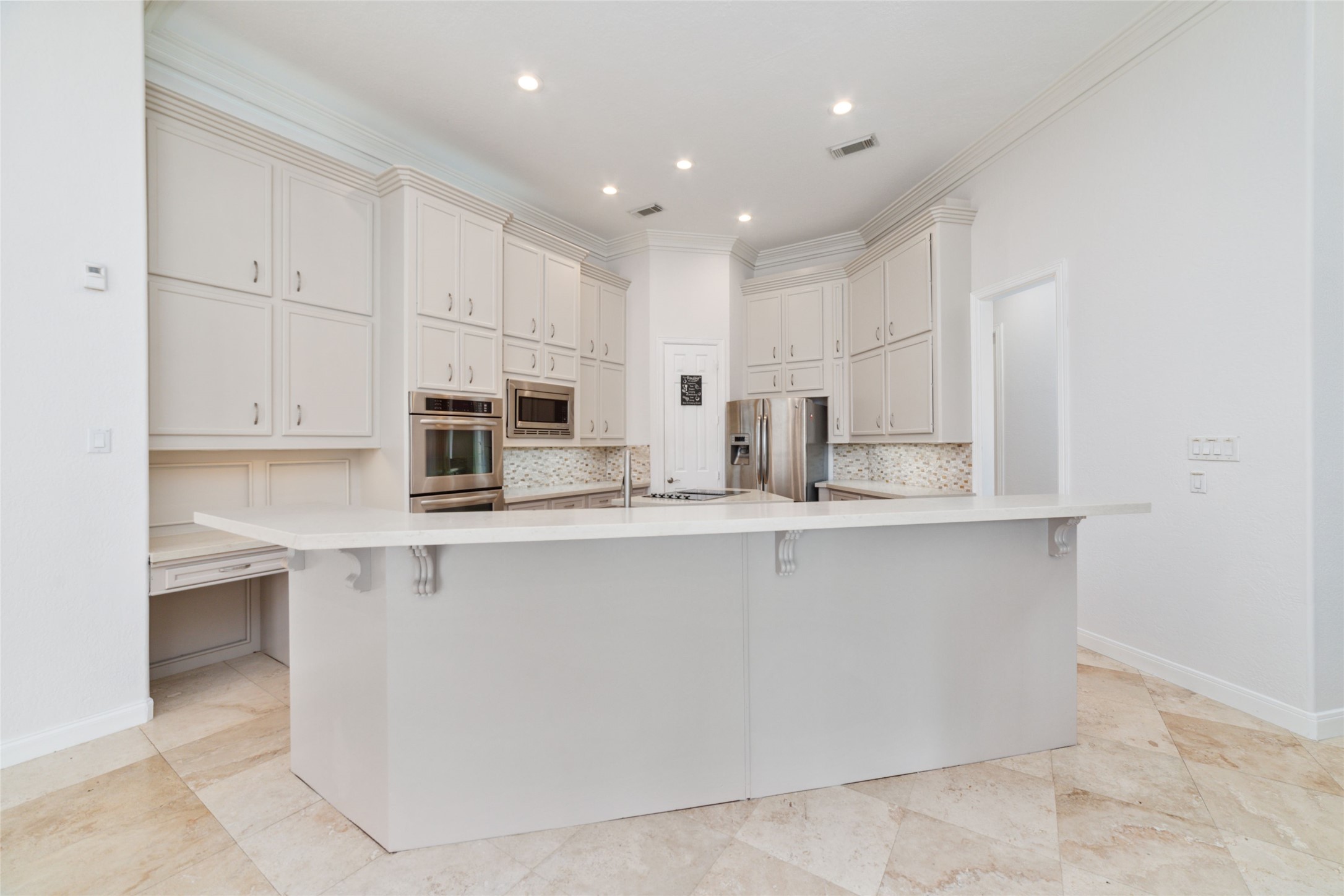 32610 Whitburn Trail Fulshear, TX 77441 - Photo 15 of 49 a kitchen with stainless steel appliances granite countertop a sink a stove and a refrigerator
