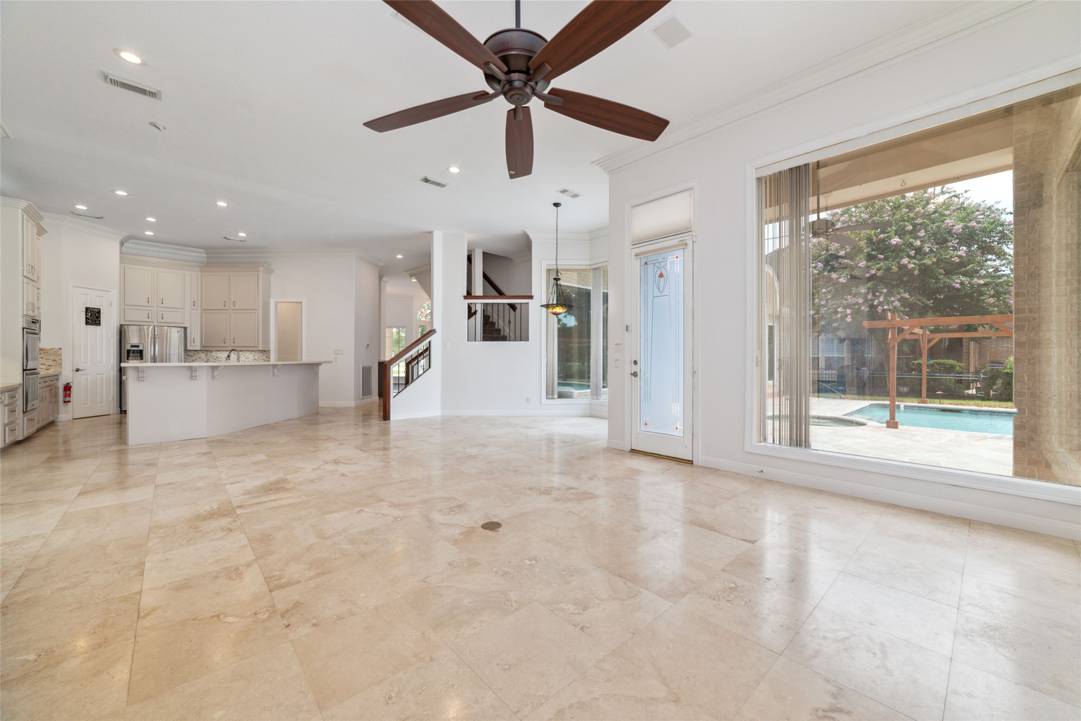 32610 Whitburn Trail Fulshear, TX 77441 - Photo 22 of 49 a view of a kitchen with a sink and a large window