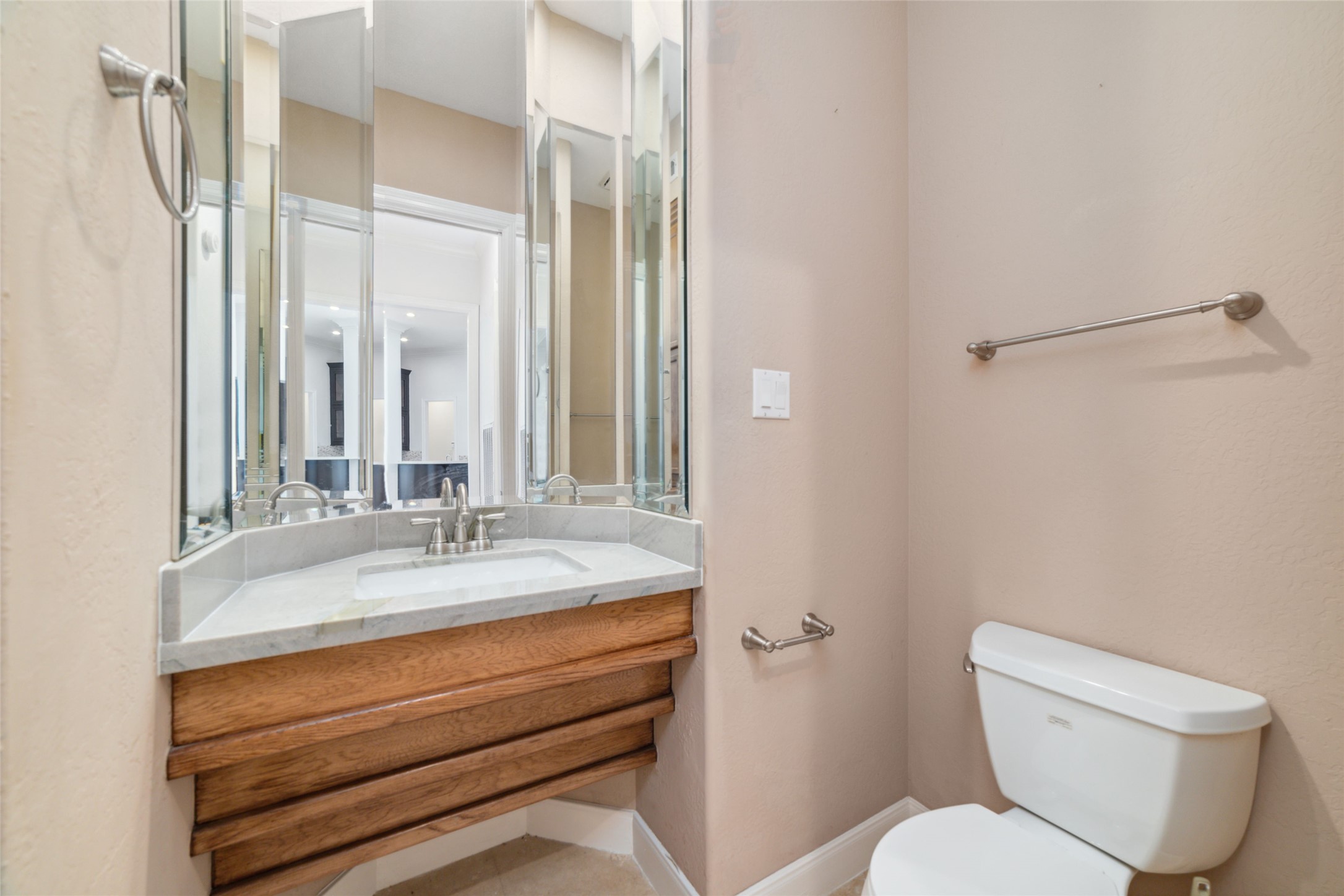 32610 Whitburn Trail Fulshear, TX 77441 - Photo 31 of 49 a bathroom with a toilet sink and mirror
