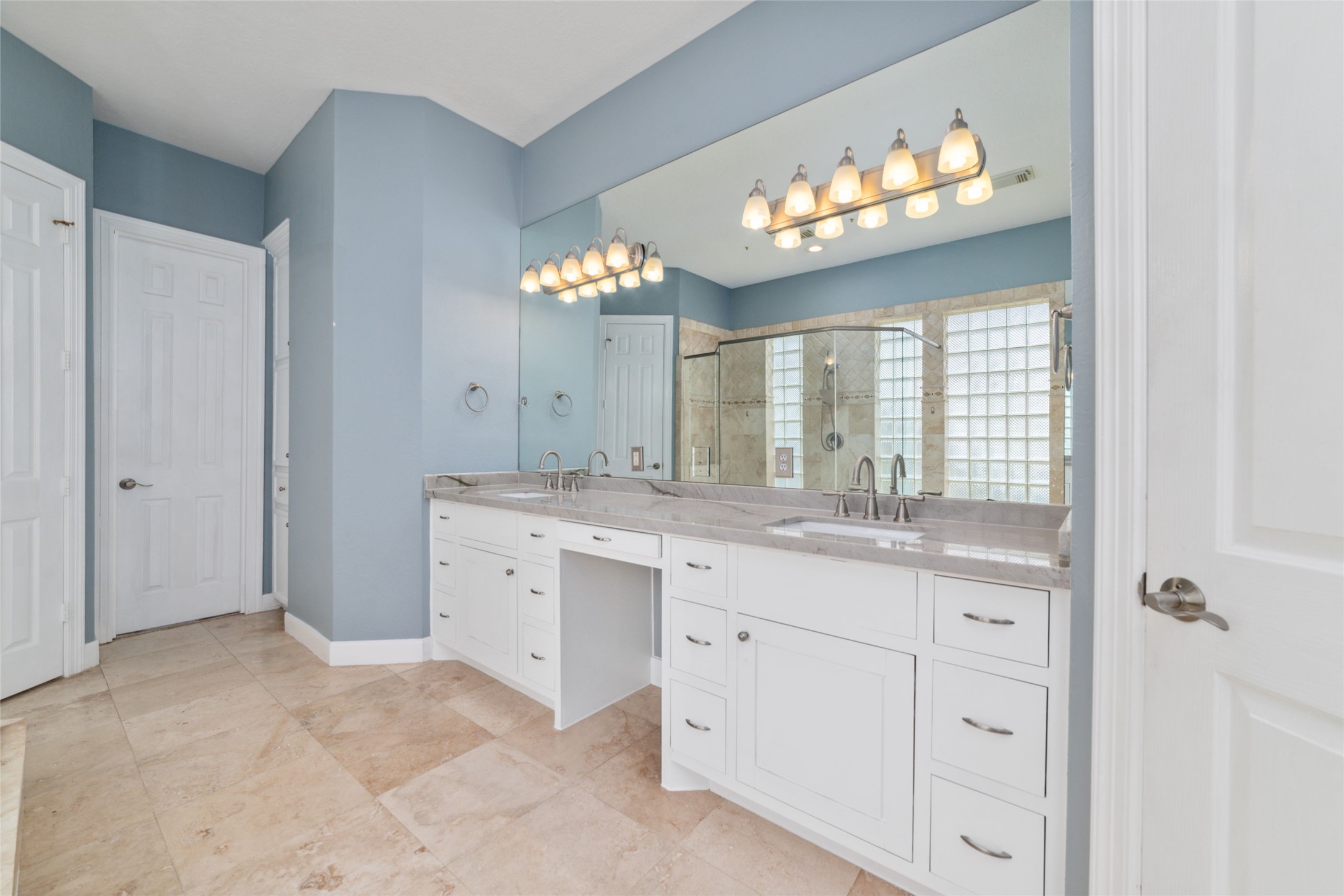 32610 Whitburn Trail Fulshear, TX 77441 - Photo 36 of 49 a bathroom with a sink vanity and a mirror