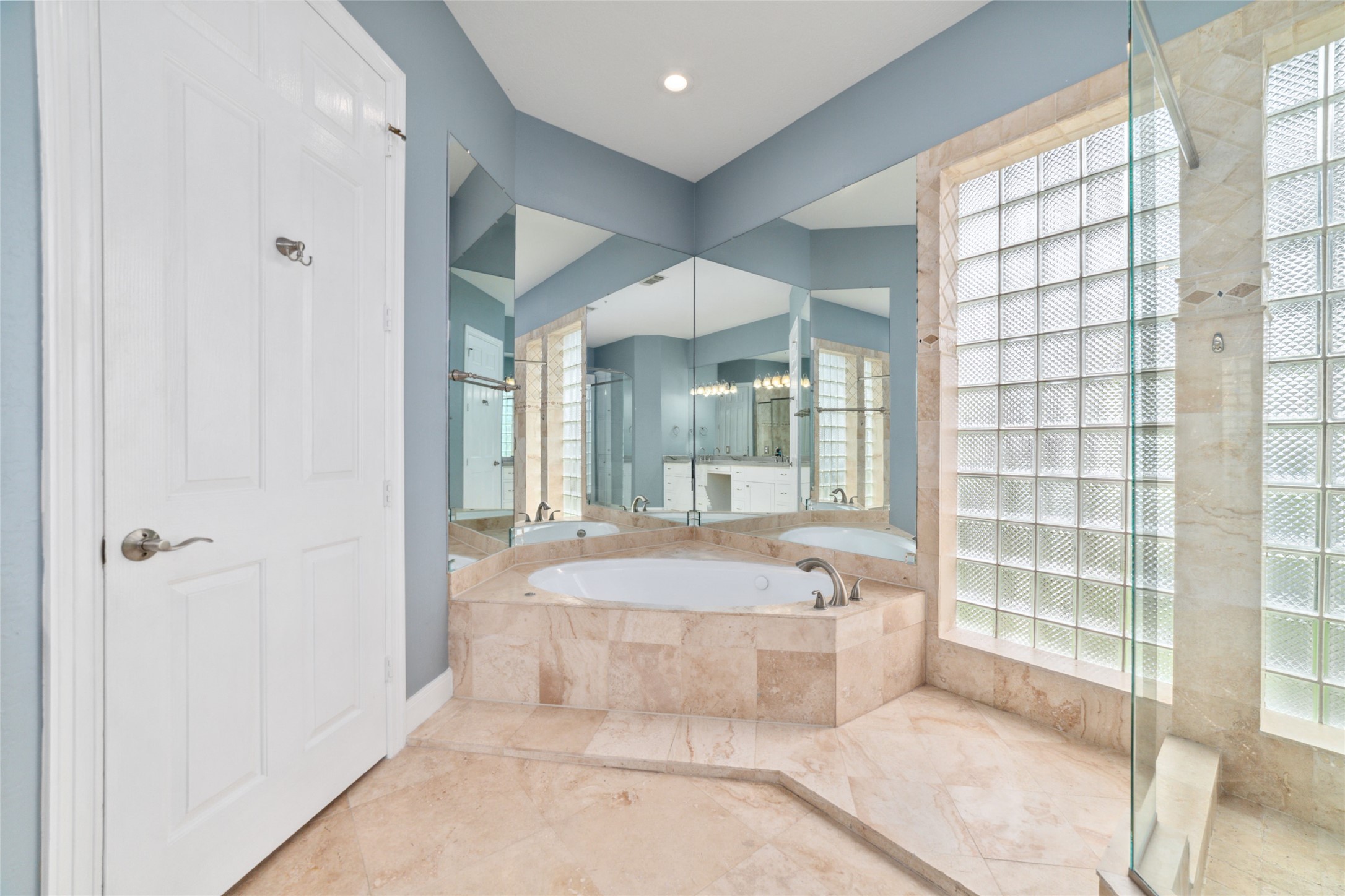 32610 Whitburn Trail Fulshear, TX 77441 - Photo 37 of 49 a spacious bathroom with a tub shower and sink