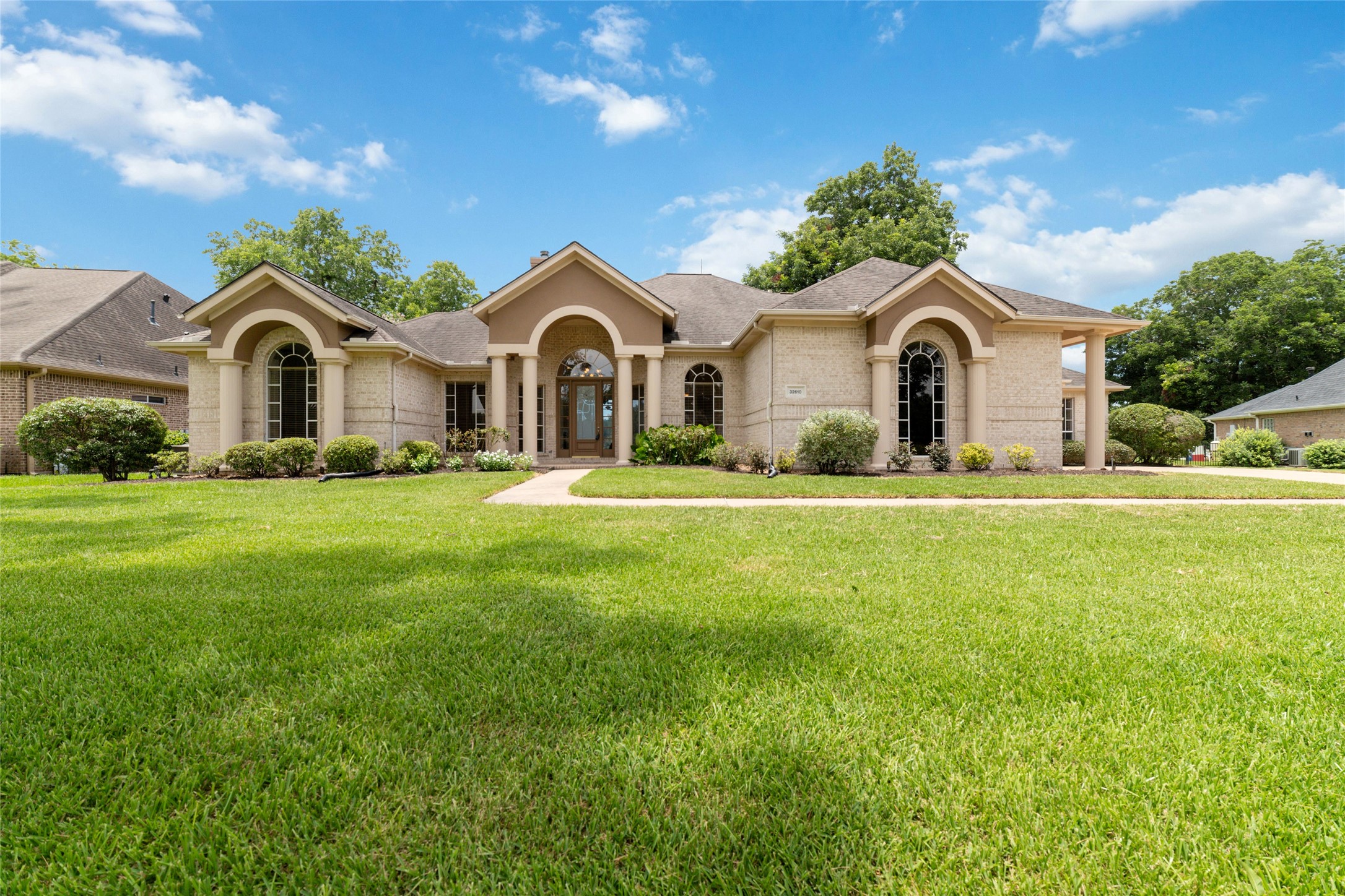 32610 Whitburn Trail Fulshear, TX 77441 - Photo 4 of 49 a front view of a house with a yard and garage