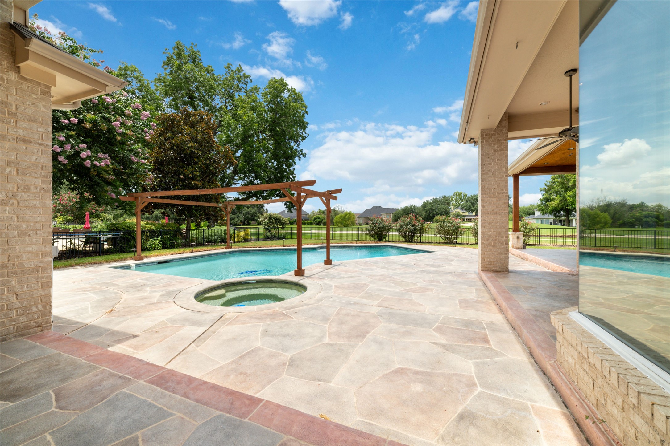 32610 Whitburn Trail Fulshear, TX 77441 - Photo 41 of 49 a view of a swimming pool with a yard