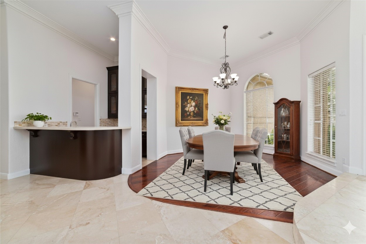 32610 Whitburn Trail Fulshear, TX 77441 - Photo 10 of 49 a dining room with a table chairs and kitchen view