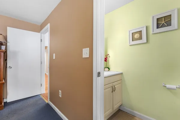 a room with cabinets and wooden floor