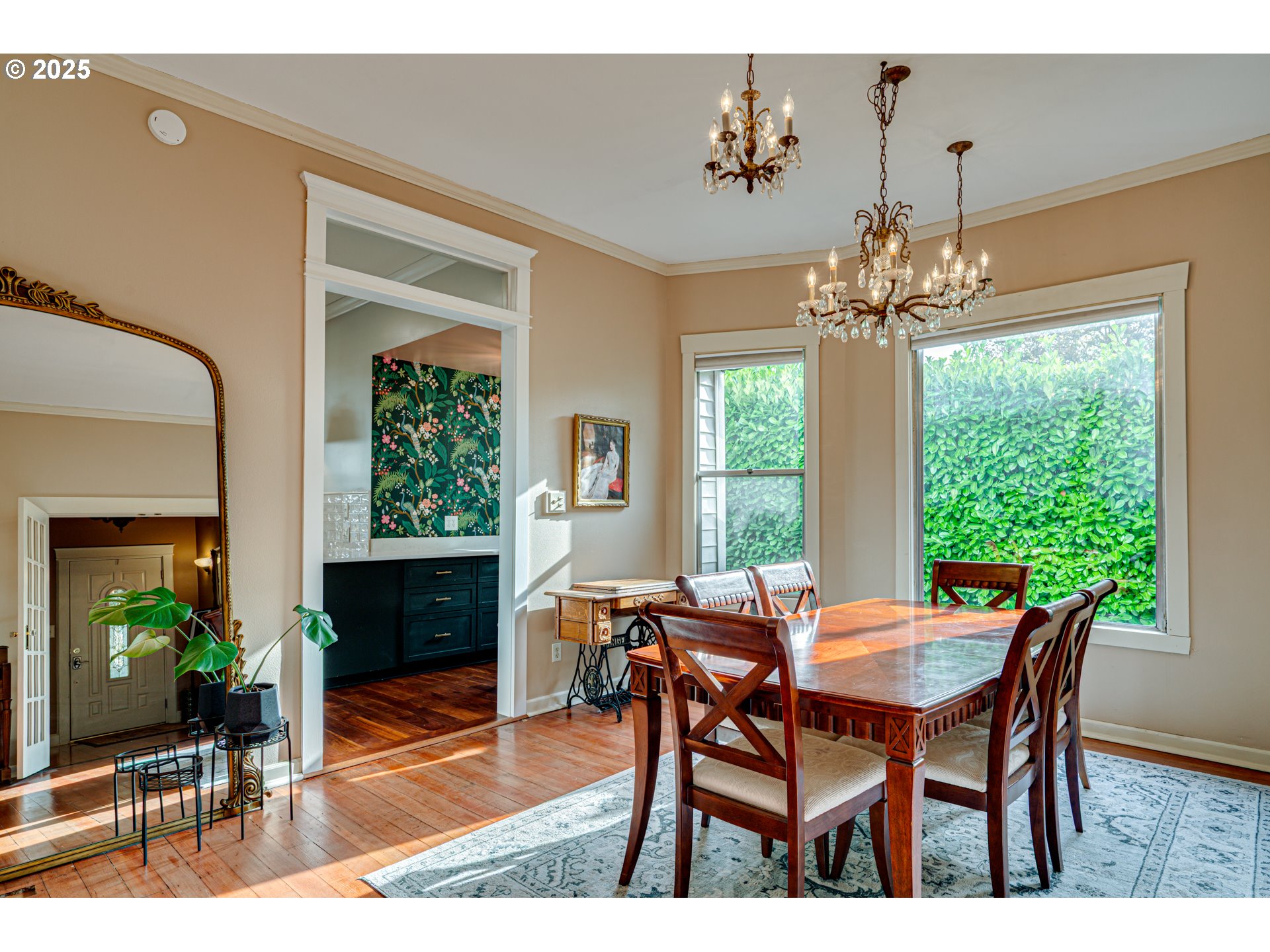 1626 21st Avenue Longview, WA 98632 - Photo 11 of 42 a dining room with furniture a floor to ceiling window and wooden floor