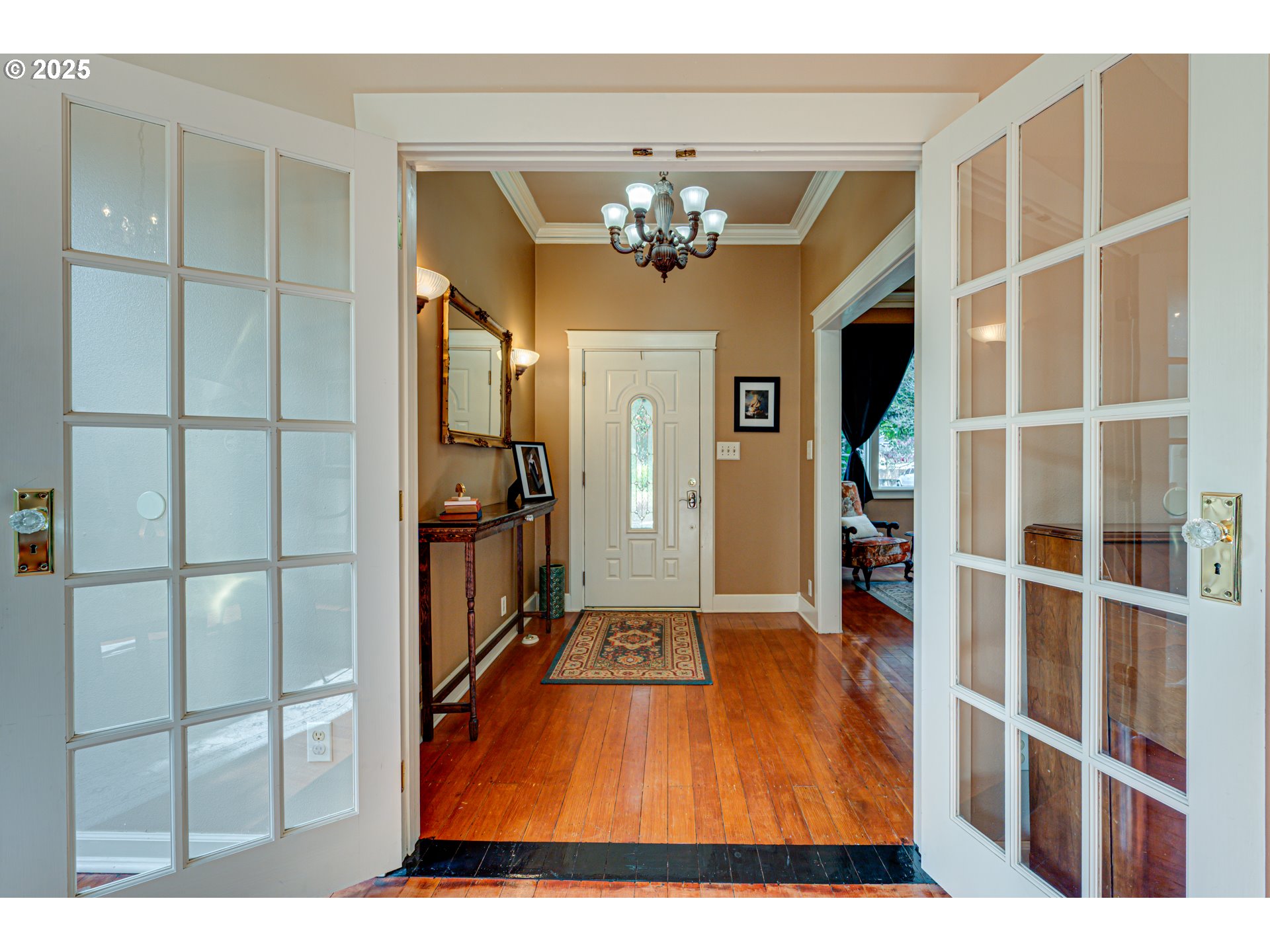 1626 21st Avenue Longview, WA 98632 - Photo 14 of 42 a living room with a furniture and a chandelier