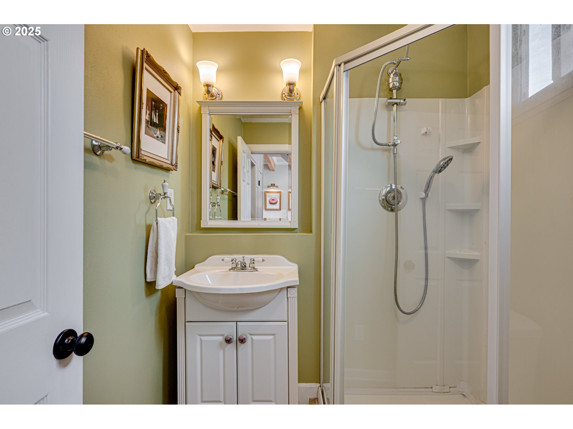 1626 21st Avenue Longview, WA 98632 - Photo 21 of 42 a bathroom with a granite countertop shower sink vanity and mirror
