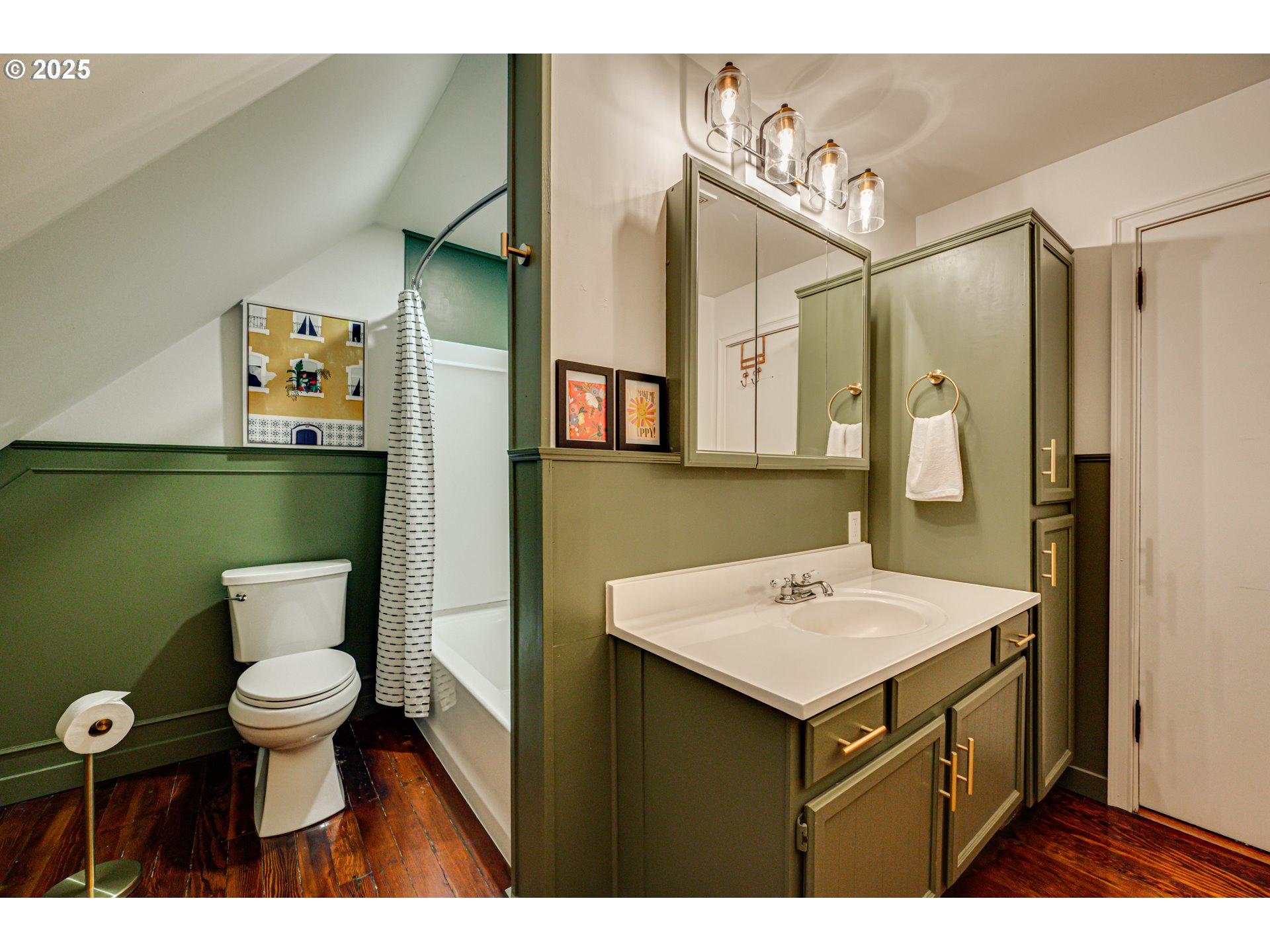 1626 21st Avenue Longview, WA 98632 - Photo 26 of 42 a bathroom with a toilet sink and mirror