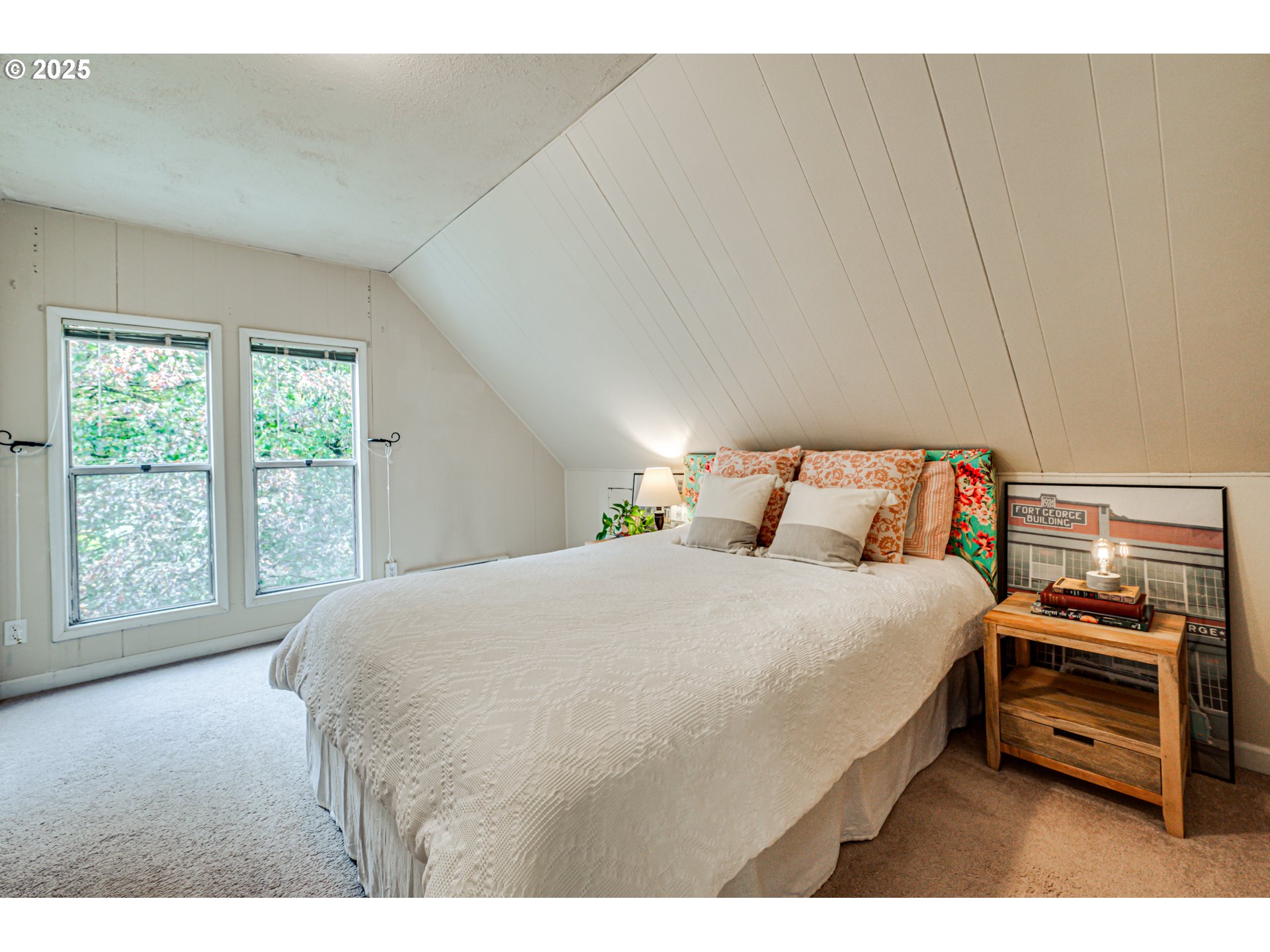 1626 21st Avenue Longview, WA 98632 - Photo 27 of 42 a bedroom with a bed and a window