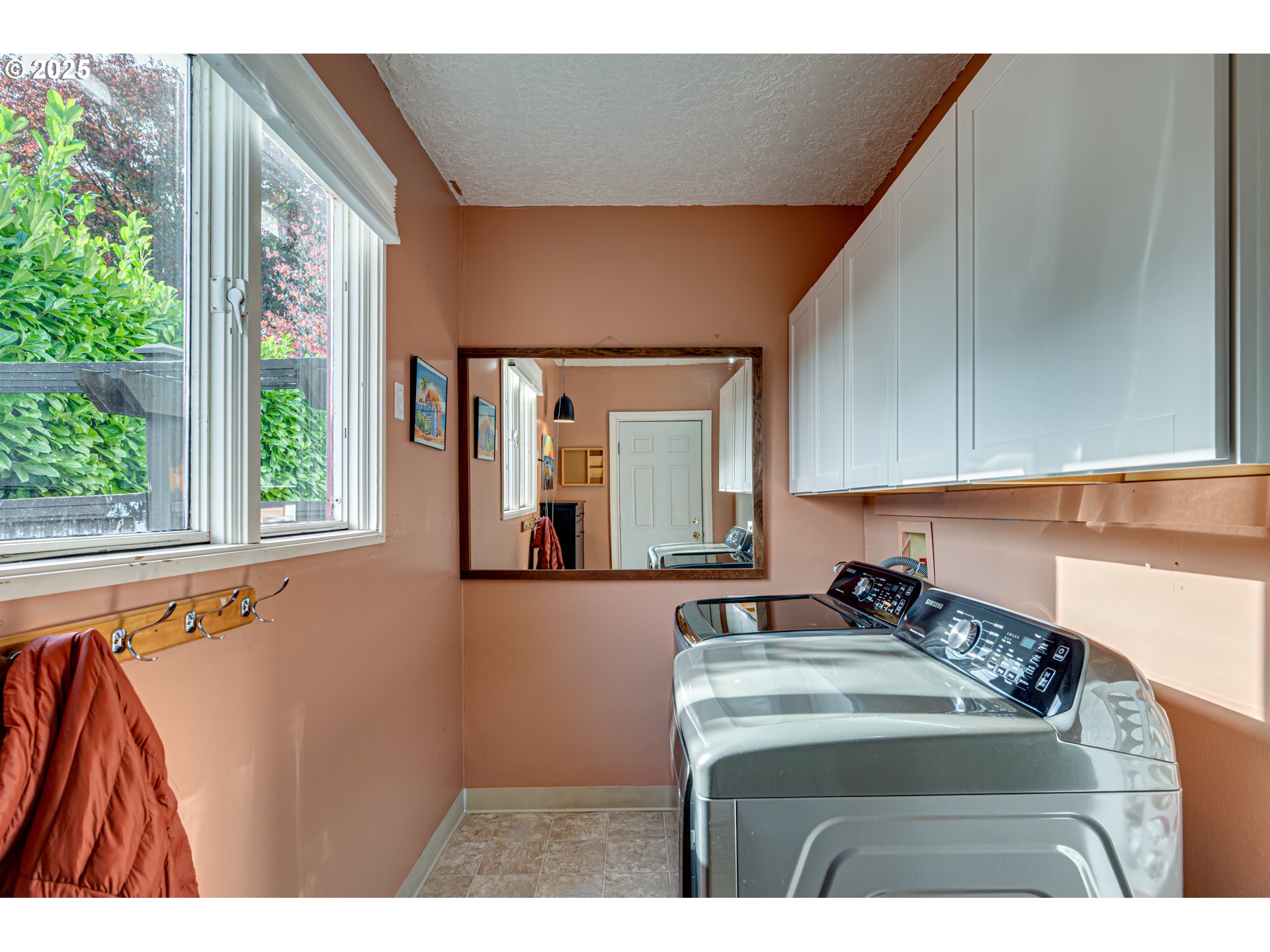 1626 21st Avenue Longview, WA 98632 - Photo 31 of 42 a kitchen view with a sink a window and cabinets