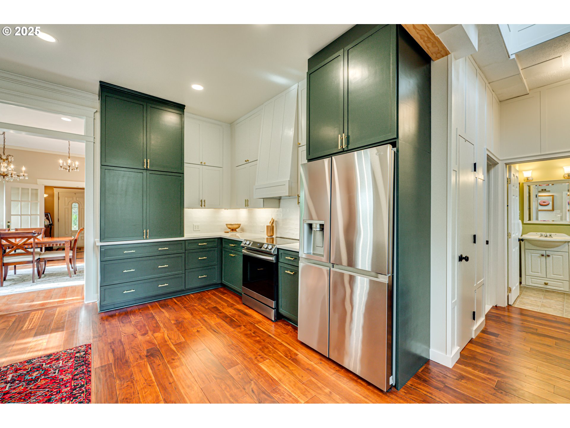 1626 21st Avenue Longview, WA 98632 - Photo 7 of 42 a kitchen with stainless steel appliances granite countertop a refrigerator and a sink