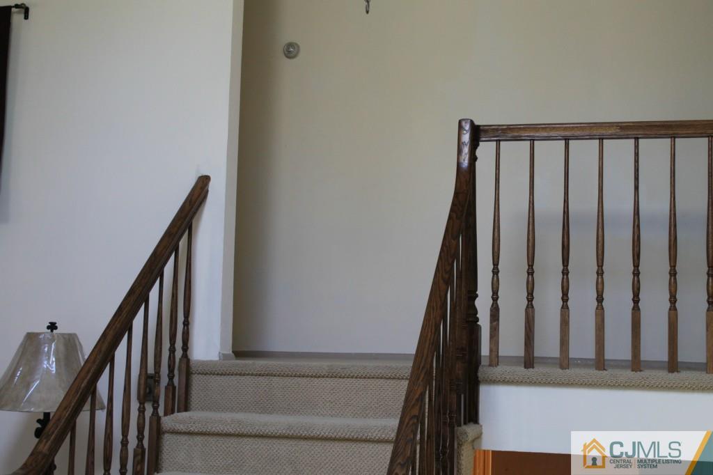 10 Greenwich Road Edison, NJ 08820 - Photo 2 of 25 a view of staircase with railing and white walls