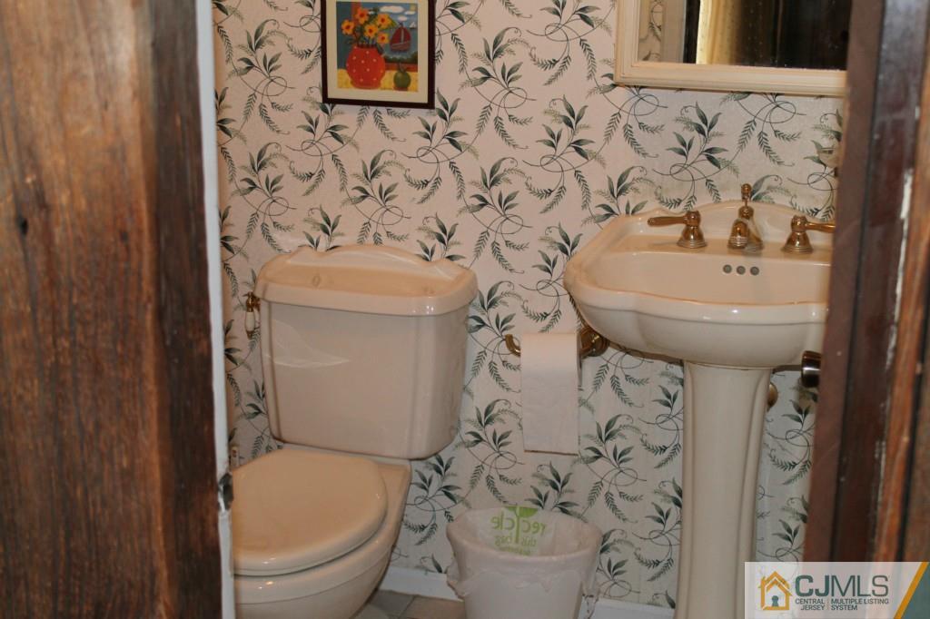 10 Greenwich Road Edison, NJ 08820 - Photo 12 of 25 a bathroom with a toilet and a sink