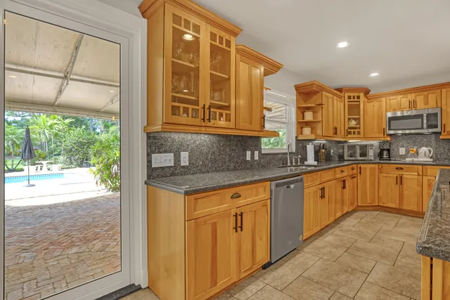 a bedroom with a bed and a television