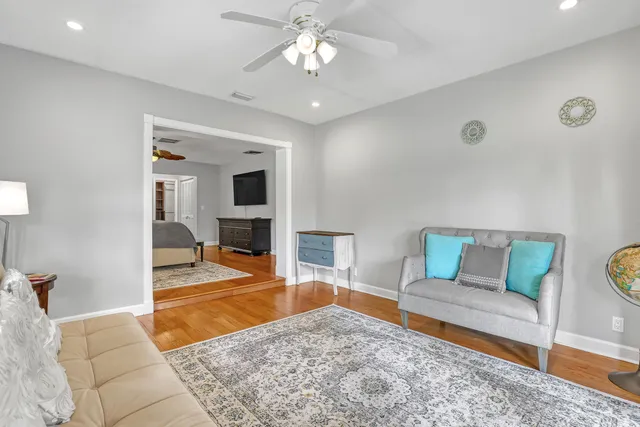 a view of a dining table and chairs in patio